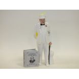 ROYAL DOULTON SIR WINSTON CHURCHILL FIGURE HN 3057 TOGETHER WITH A SMALL WINSTON CHURCHILL BOOK