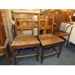 A PAIR OF ANTIQUE OAK DINING CHAIRS