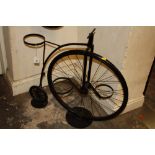 A PENNY FARTHING STYLE PLANT POT HOLDER