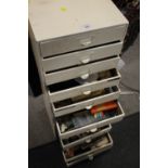 THREE 4 DRAWER WATCH MAKERS CHEST OF DRAWERS CONTAINING CLOCK AND WATCH PARTS, TOOLS ETC