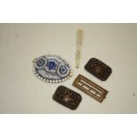 A BAG OF VINTAGE BELT BUCKLES ETC. TO INCLUDE A BEAD WORK EXAMPLE