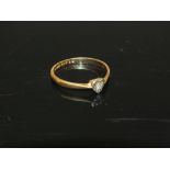 AN 18CT GOLD HEART SHAPED ILLUSION SET DIAMOND RING