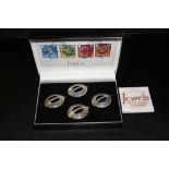 A BOXED SET OF FOUR CELTIC SILVER BROOCHES