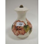 A MOORCROFT HIBISCUS PATTERN CERAMIC TABLE LAMP