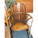 AN OAK WHEELBACK HOOPBACK ARMCHAIR