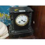 A VINTAGE SLATE AND MARBLE MANTEL CLOCK OF SMALL PROPORTIONS