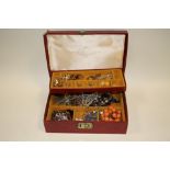 A BOX OF COSTUME JEWELLERY TO INCLUDE A SILVER BRACELET