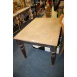 AN OAK KITCHEN TABLE WITH A PLY TOP
