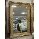 A HUGE GILT MIRROR WITH BEVELLED GLASS 227 cm X 142 cm