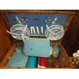 A VINTAGE WICKER BREXTON PICNIC HAMPER AND CONTENTS