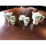 AN ART DECO HANCOCKS PORCELAIN CONICAL SHAPED COFFEE SET, comprising coffee pot,