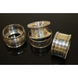 FOUR HALLMARKED SILVER NAPKIN RINGS