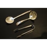 A HALLMARKED SILVER SIFTER, SPOON AND A PAIR OF TONGS