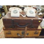 TWO VINTAGE TELEPHONES AND TWO VINTAGE SUITCASES
