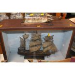 A SHIP IN A DISPLAY CASE TOGETHER WITH A SHIP IN A BOTTLE (2)