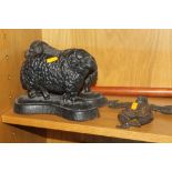 TWO CAST DOORSTOP TOGETHER WITH A CAST NOVELTY FIGURE (3)