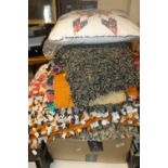 A QUANTITY OF ASSORTED RAG RUGS AND A CUSHION