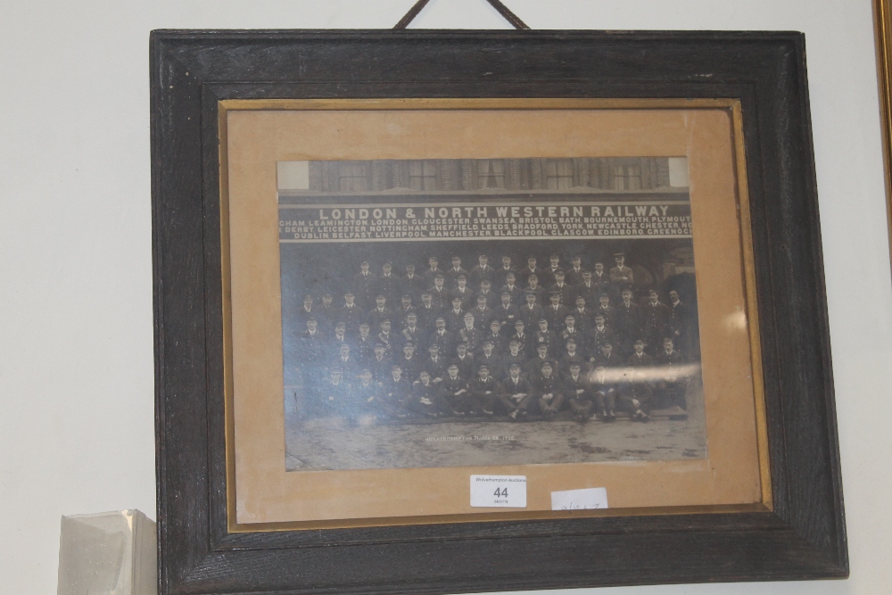 WOLVERHAMPTON RAILWAY INTEREST - a framed photograph of staff at Wolverhampton, March 28 1920, taken