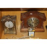 AN OAK CASED MANTLE CLOCK TOGETHER WITH A SMALL CARRIAGE CLOCK AND ANOTHER