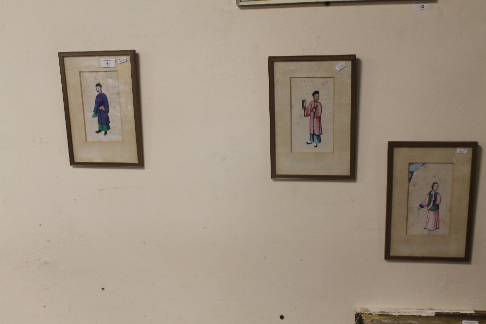 THREE RICE PAPER PAINTINGS EACH DEPICTING A STANDING FIGURE IN TRADITIONAL COSTUME