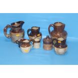 A QUANTITY OF ROYAL DOULTON LAMBETH STYLE WARE JUGS (NOT ALL DOULTON)
