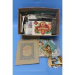 A QUANTITY OF ASSORTED CIGAREETE CARDS, LOOSE AND IN ALBUMS