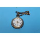 A YELLOW METAL POCKET WATCH