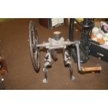 A 19TH CENTURY SHOP COUNTER COFFEE GRINDER, cast iron with large fly wheel