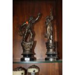 A PAIR OF SPELTER STYLE FIGURES