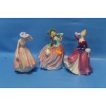 THREE ROYAL DOULTON FIGURINES TO INCLUDE "MELISSA", "AUTUMN BREEZES" AND "SWEET APRIL"