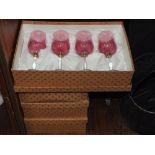 FOUR BOXED SET OF DRINKING GLASSES