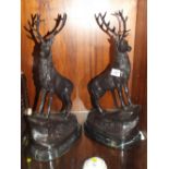 A PAIR OF BRONZED EFFECT STAG FIGURES ON MARBLE PLINTHS SIGNED J.MOLGMIES