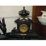 A LARGE SLATE MANTLE CLOCK