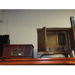 A VINTAGE RADIO IN CABINET TOGETHER WITH A RECORD/ CD PLAYER (2)