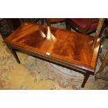 A MAHOGANY COFFEE TABLE