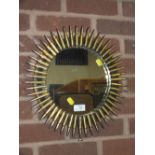 A TRENCH ART CIRCULAR MIRROR FRAMED BY BULLETS