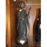 A MODERN BRONZE EFFECT GEISHA FIGURE PLAYING A LUTE