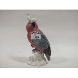 A BESWICK COCKATOO FIGURE MODEL NO. 1180