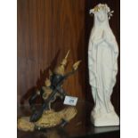 A BRONZE EFFECT MUSICIAN FIGURE TOGETHER WITH A RELIGIOUS FIGURE (2)