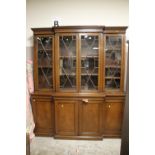 AN EDWARDIAN MAHOGANY BREAKFRONT LIBRARY BOOKCASE - H 218, W 193, D 52 cm