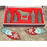 A BOXED ORIENTAL COLLECTABLES SET TOGETHER WITH A PAIR OF SLIPPERS