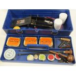 A CASED BLACK POWDER / GUN ACCESSORY KIT