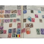 AN ALBUM OF VINTAGE STAMPS