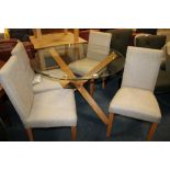 A MODERN GLASS TOPPED OAK DINING TABLE WITH FOUR CHAIRS