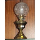 A VINTAGE BRASS OIL LAMP WITH SHADE AND FLUTE