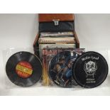 A CASE OF 7" SINGLE RECORDS TO INCLUDE PICTURE DISCS, IRON MAIDEN, AC/DC, THE CLASH ETC.
