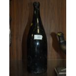 AN ANTIQUE MAGNUM BOTTLE