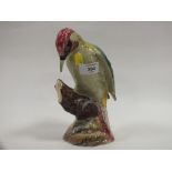 A BESWICK WOODPECKER FIGURE MODEL NO. 1218