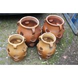 FOUR CERAMIC PLANTERS