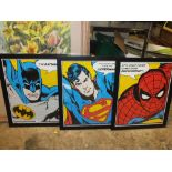 A SET OF THREE MODERN FRAMED AND GLAZED SUPERHERO PRINTS